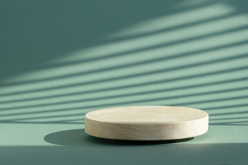 Wooden round podium on green background Light on wall. The concept mockup