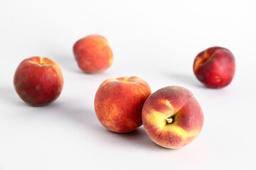Sweet peaches on white background