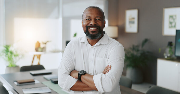 Mature, portrait or black man with arms crossed in office as confident project manager for development. Opportunity, smile or proud entrepreneur in startup company with mission or business commitment