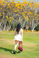 little girl walking in the park