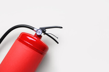 Fire extinguisher on grey background