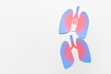 Paper lungs on grey background