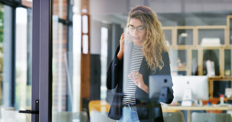 Window, phone call and woman with conversation, serious and business owner with negotiation. Glass, manager and smartphone with communication, connection and stress for contact and concern in office