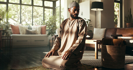 Muslim, worship and religion with man at home for ramadan kareem, spiritual and prayer. Floor, faith and eid Mubarak with Islamic person and salah in living room for gratitude, Allah praise or salaam