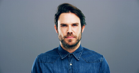 Creative, professional and portrait of businessman in studio for staff ID, company card and about us. Space, entrepreneur and face of person for career, job and employee profile on grey background