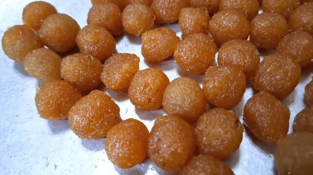 Golden pineapple jam balls are ready to be used as a filling for Nastar cakes. 