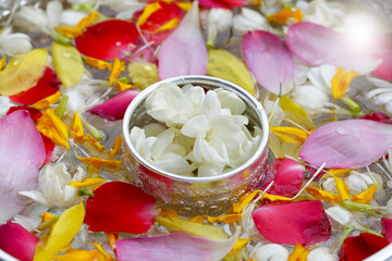 Water with flower in silver bowl. Thai tradition, Songkran festival concept