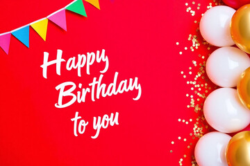 Naklejka premium birthday card with balloons and confetti on a red background