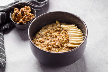 oatmeal porridge with banana, honey and walnuts