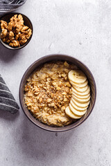 oatmeal porridge with banana, honey and walnuts