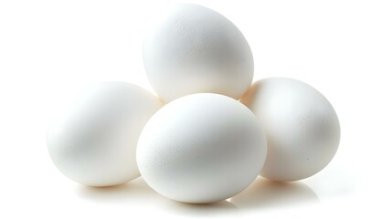 Group of three white eggs isolated on white