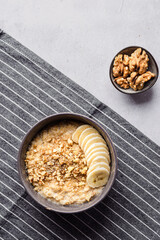 oatmeal porridge with banana, honey and walnuts