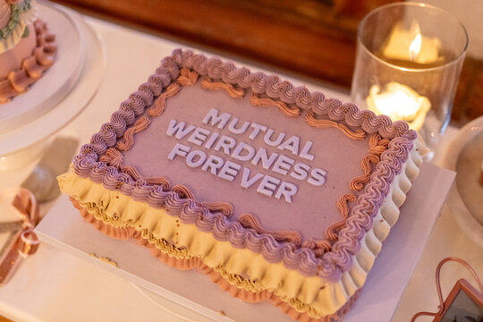 Quirky wedding cake mutual weirdness forever