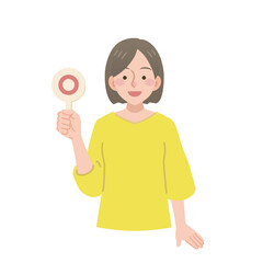 丸のサインを出す女性