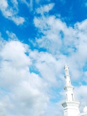 The Holy Tower Splits the Clouds, the Majesty of the Mosque Under the Sky