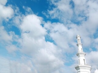 The Holy Tower Splits the Clouds, the Majesty of the Mosque Under the Sky