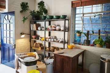 Ceramics, shelf and small business with pottery for creative store, bowls and manufacturing startup. Clay products, collection and handmade in workshop, craft shop and production with tools in studio