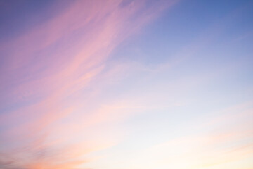 Soft pastel skies at dawn transition into vibrant daylight