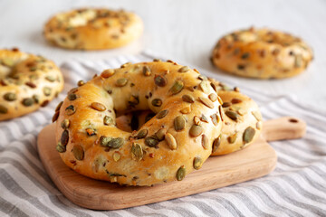 Homemade Healthy Organic Pumpkin Seed Bagels for Breakfast, side view.