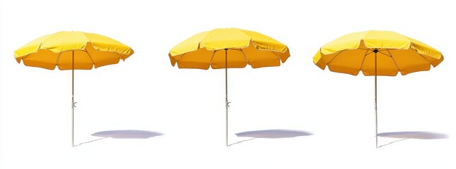 Obraz premium Three vibrant yellow beach umbrellas aligned on a bright sunny day, casting subtle shadows on the ground.