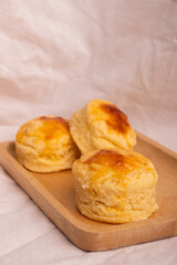 Homemade Cheese Scone on wooden plate