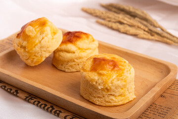 Homemade Cheese Scone on wooden plate
