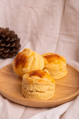Homemade Cheese Scone on wooden plate