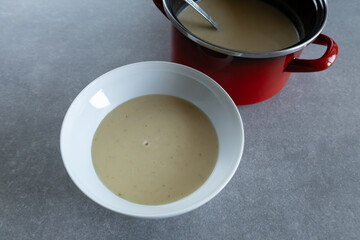Creamy celery soup served.