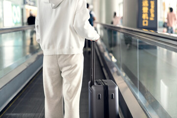 Passenger in the airport terminal.
