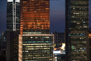 Skyscraper in modern city at night.
