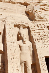 Colossal standing statues of Ramses at entrance of the Temple of Nefertari, Egypt