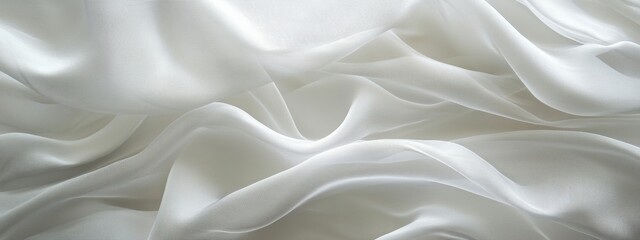 Obraz premium Elegant White Satin Fabric with Soft Waves and Flowy Texture