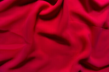 Vibrant red Fabric with Soft Folds – Elegant Abstract Textile Background