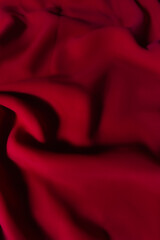 Vibrant red Fabric with Soft Folds – Elegant Abstract Textile Background