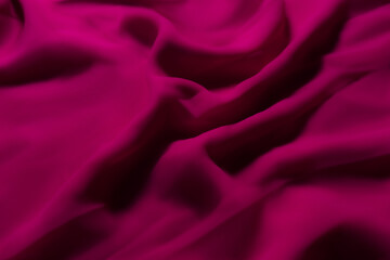 Vibrant Magenta Fabric with Soft Folds – Elegant Abstract Textile Background