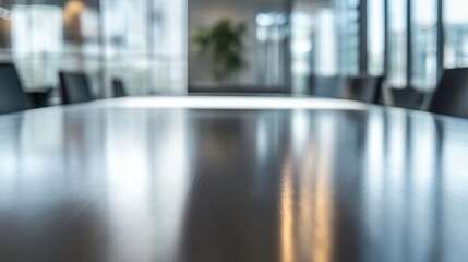 Empty modern conference room table. Blurry background of chairs and windows.