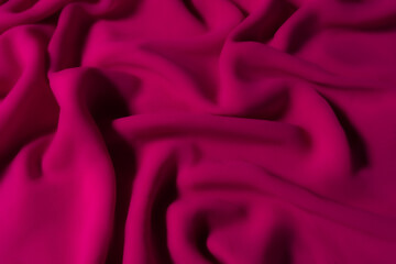 Vibrant Magenta Fabric with Soft Folds – Elegant Abstract Textile Background