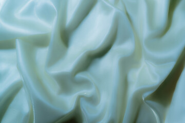 Elegant Light Blue Satin Fabric with Soft Folds – Abstract Texture