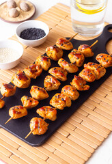 Chicken skewers in teriyaki sauce. Asian food.