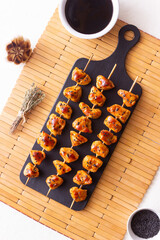 Chicken skewers in teriyaki sauce. Asian food.