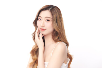 Fototapeta premium A beautiful young Asian woman with clean, fresh skin against a white background. She represents beauty, skincare, and spa treatments.