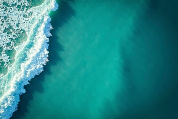 Turquoise ocean waves from above, a serene seascape of calm and beauty.