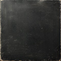 Fototapeta premium Plain black textured background with vintage distressed look