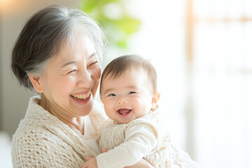 笑うおばあちゃんと赤ちゃん（日本人・アジア人・家族・子供）