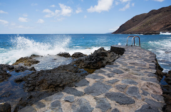 waves crashing at bathing pier, Tamaduste bay, El Hierro, Canary Islands