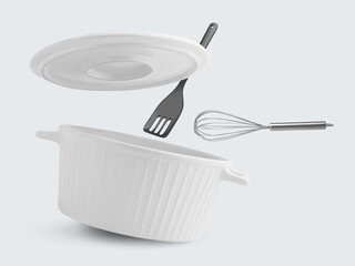 Saucepan, slotted spatula and whisk in air on white background