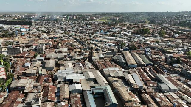 Aerial view of densely populated kibera slum with crowded rooftops and informal settlements, Nairobi, Nairobi, Kenya.