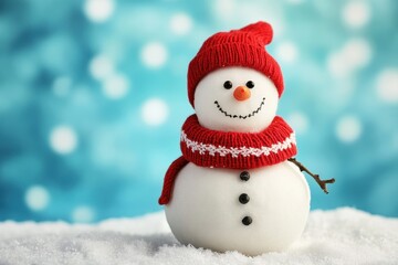 Obraz premium Happy jolly snowman smiles brightly on a blue background, spreading cheer and laughter