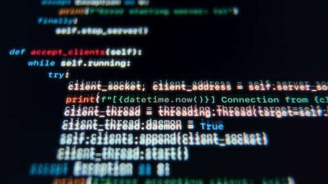 Close-up display of technical coding scripts on a screen. Concept of artificial intelligence, cyber security, or machine learning.