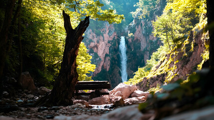 A scenic waterfall flows through lush green forest landscape view